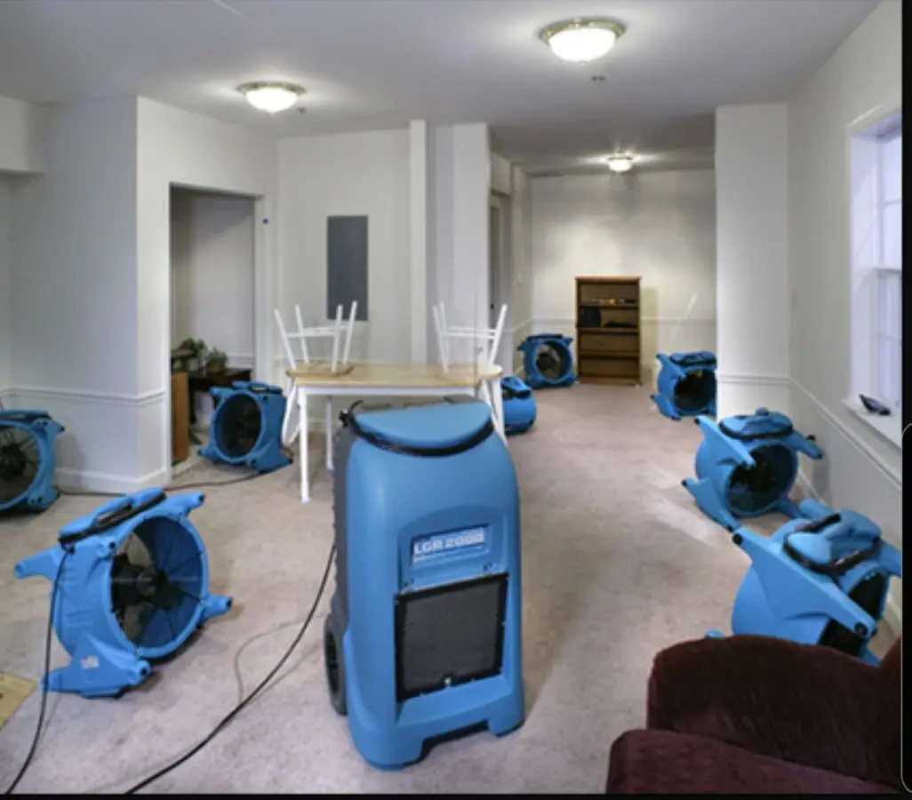 Air movers and dehumidifier setup for Water Damage Restoration in Davie